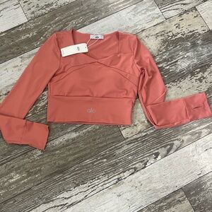 ALO Yoga Long Sleeve Cropped Wrap-Style Top in Coral
